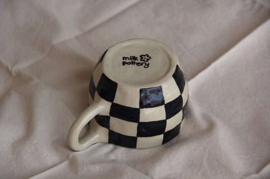 Checkmate’s Mugg