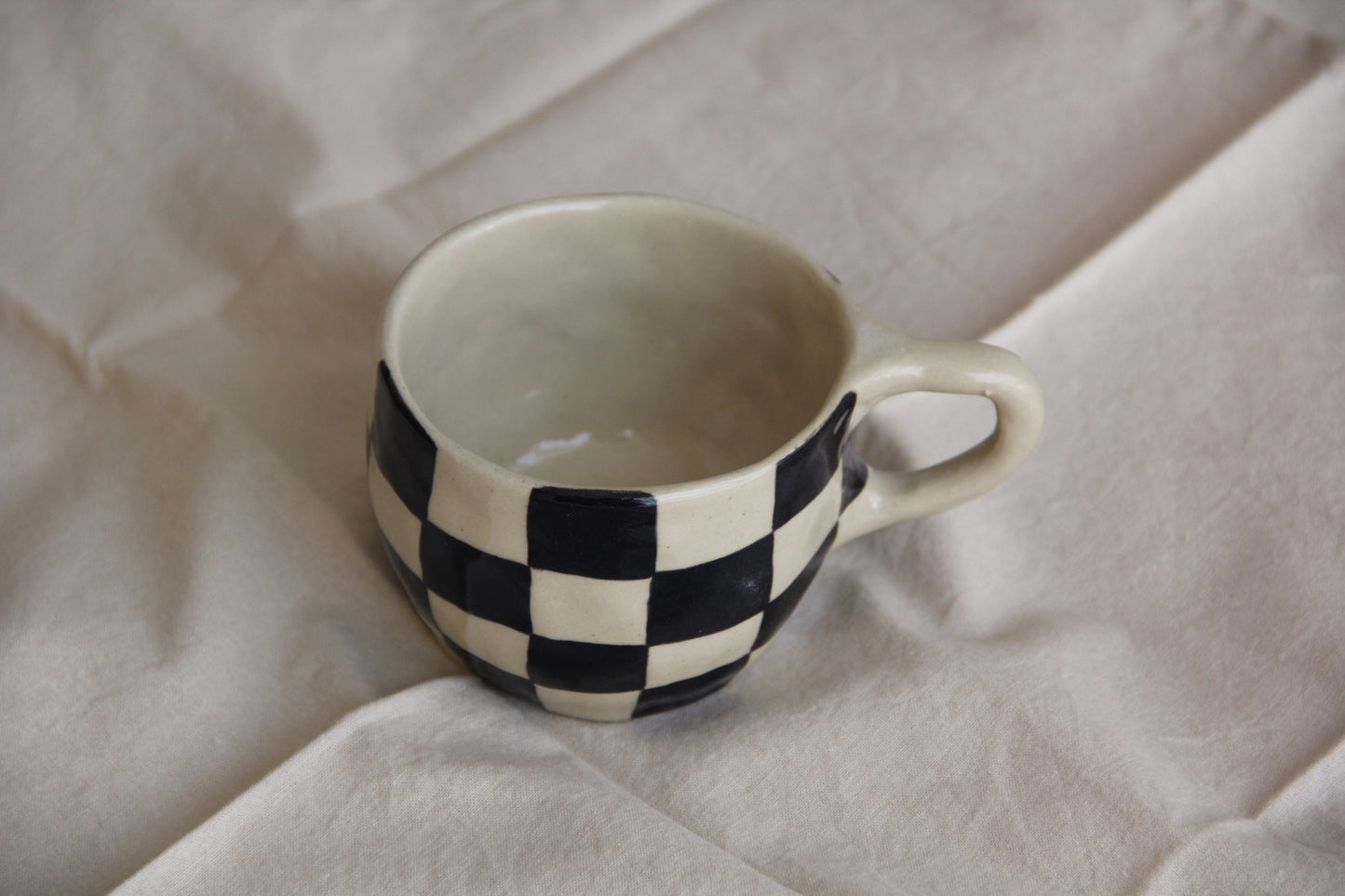 Checkmate’s Mugg