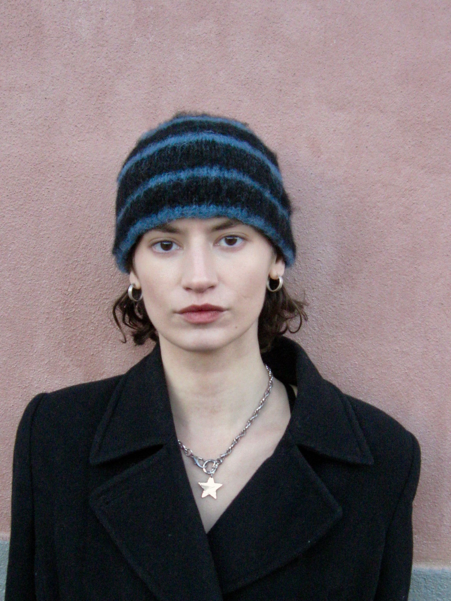 Black beanie with blue stripes
