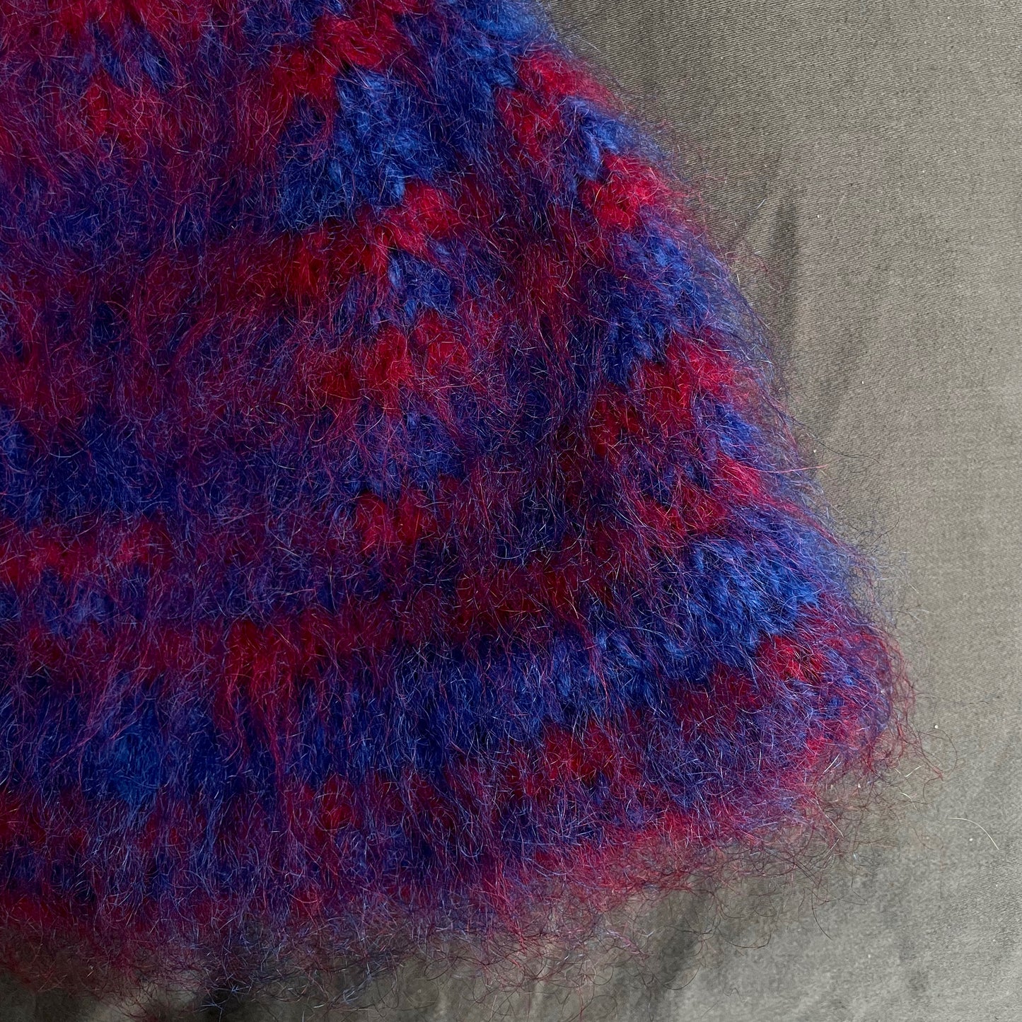 Blue beanie with red stripes
