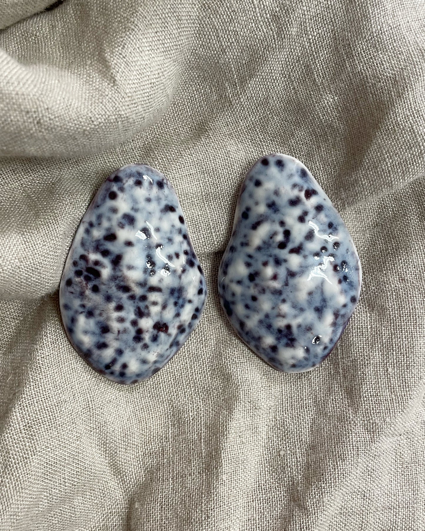 Hammered shell purple earrings