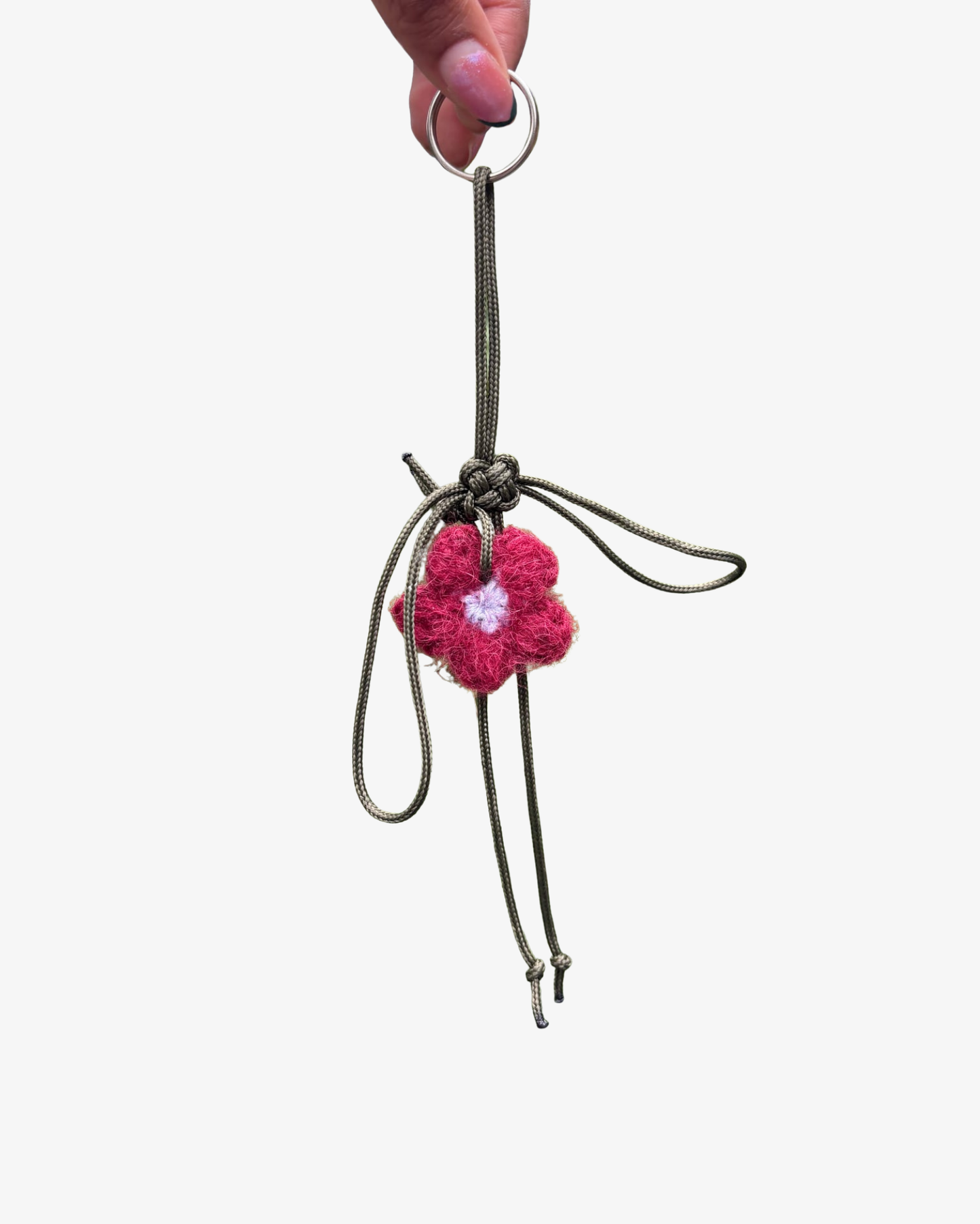 Väskberlock med blomma