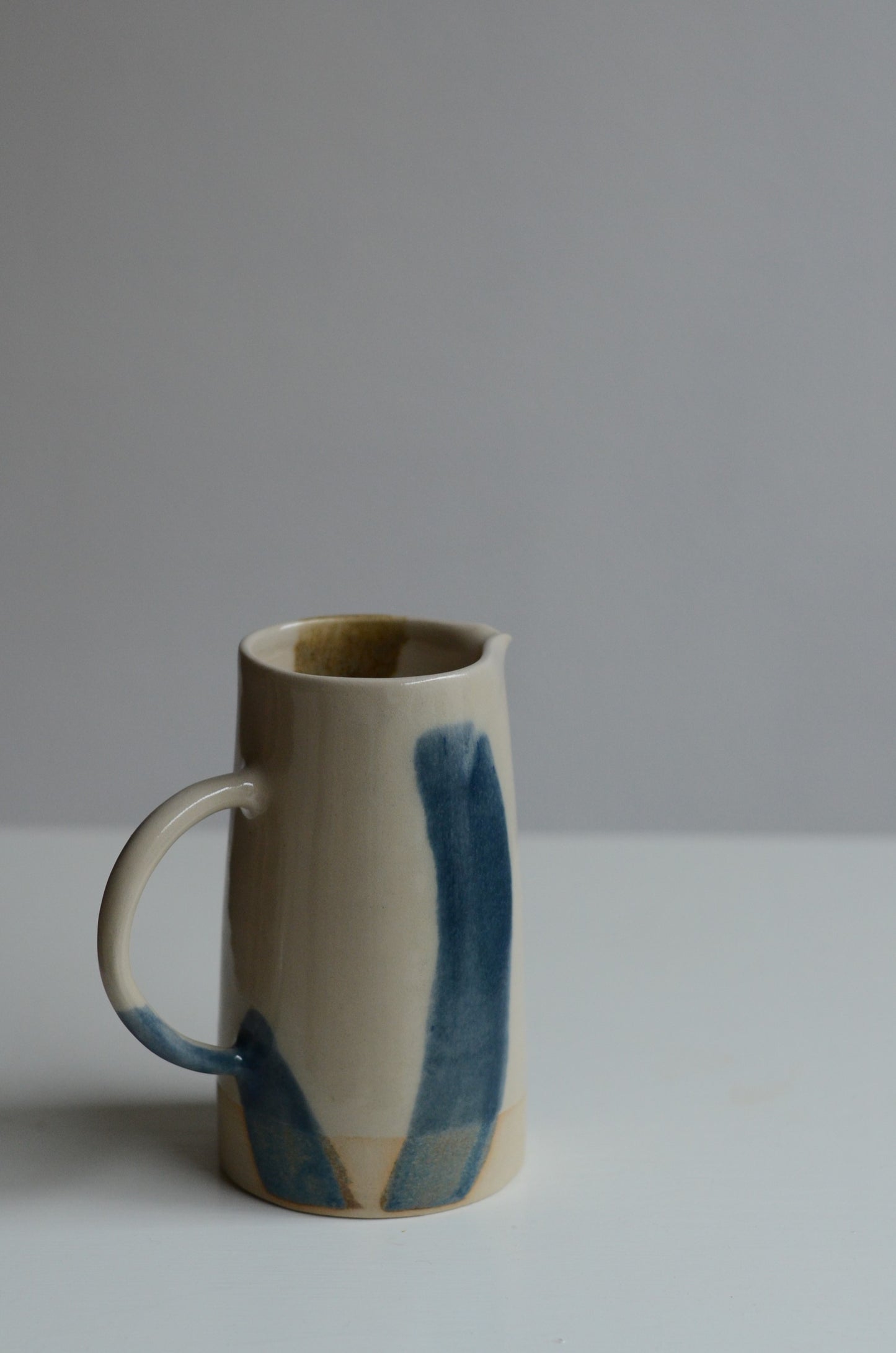 Yellow and blue striped jug
