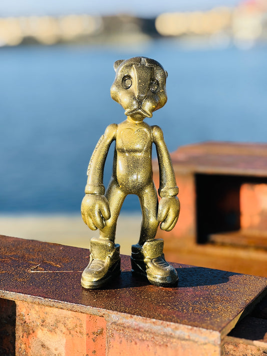 Au79 Goldie Skulptur