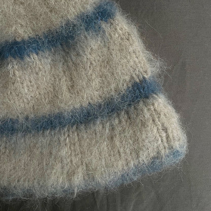 Beige beanie with blue stripes