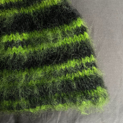 Black beanie with green stripes