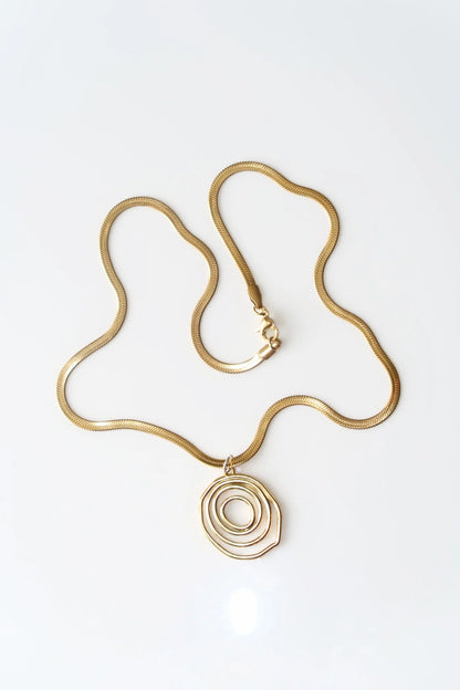 ZINNIA - Guld Swirl Halsband