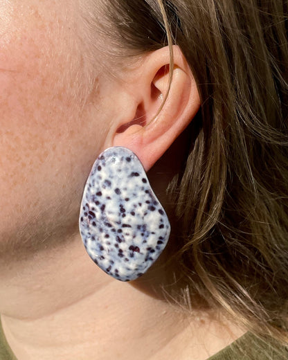 Hammered shell purple earrings